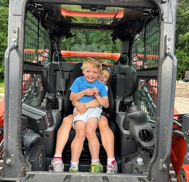 Flannel Landworks family with forestry mulching equipment