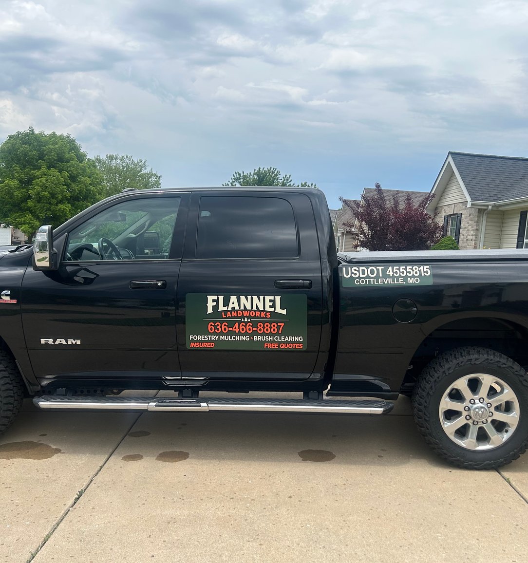 Flannel Landworks land clearing service truck